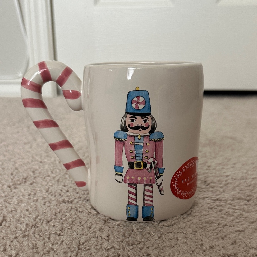 Rae Dunn Festive Nutcracker Mug with Pink Candy Cane Handle